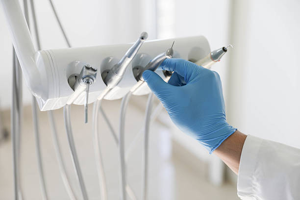 Professional Tooth Extraction technician working in Briarcliff, TX
